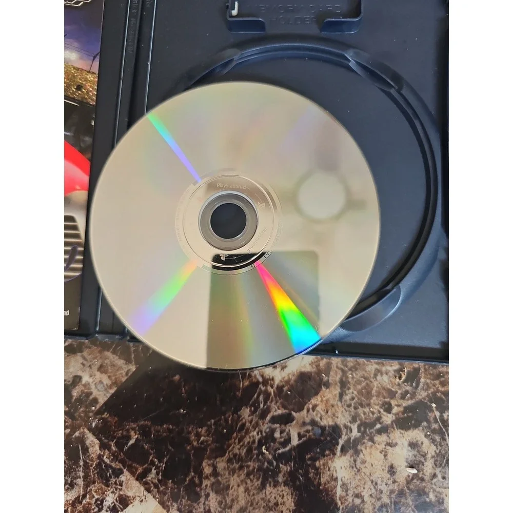 Powerdrome‎ (Sony PlayStation 2, 2004)